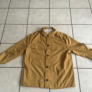 Zara light jacket in mustard.